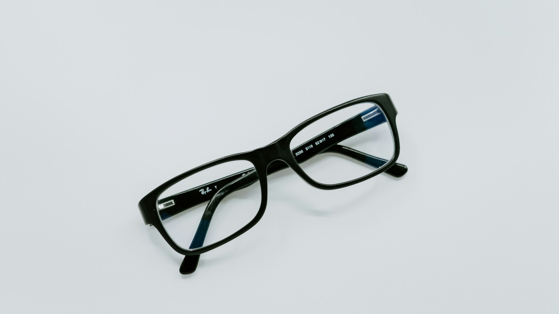black-framed eyeglasses