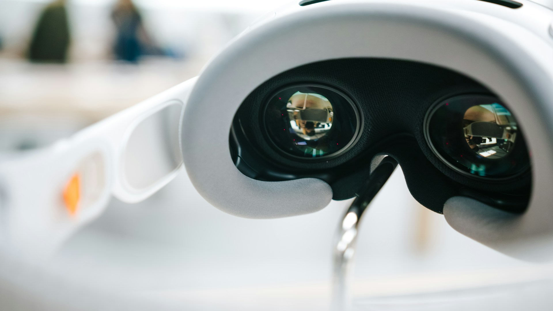 a close up of a pair of glasses attached to a device