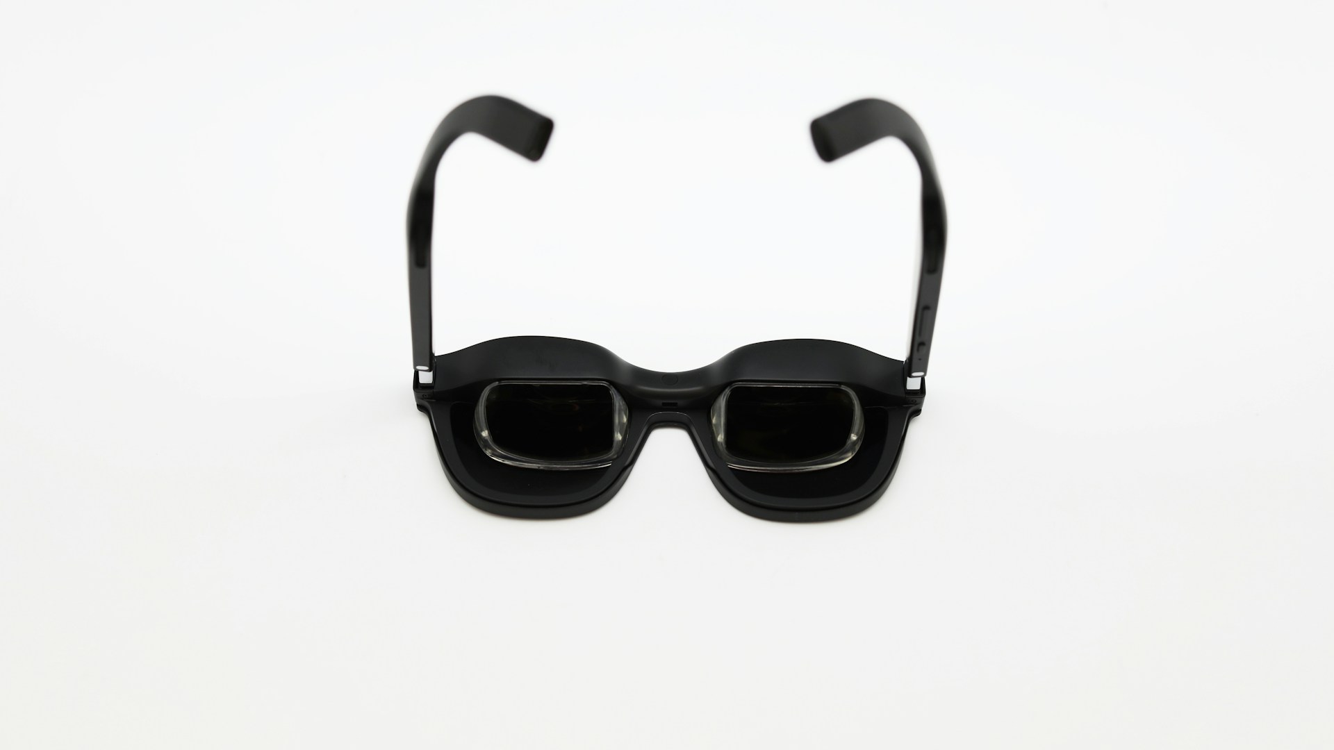 Black 3D glasses on a white background