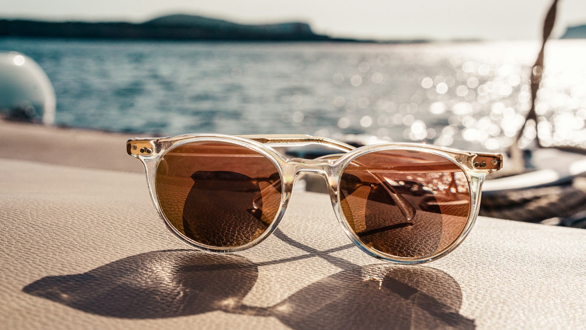 white framed brown lens sunglasses